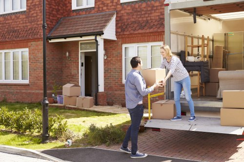 Moving truck and packed boxes outside a house in Enfieldtown