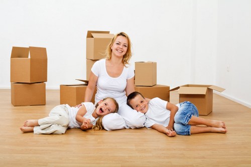 Furniture and boxes being loaded for a local removal service