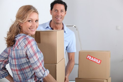Removalists unloading items at a new Enfieldtown home