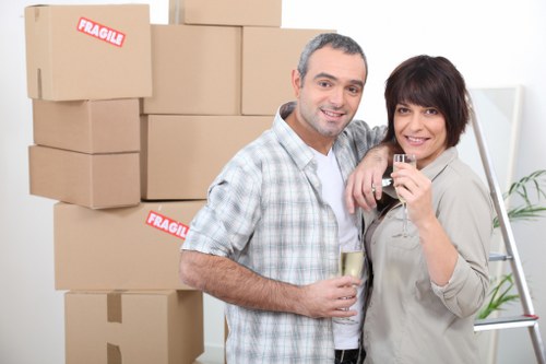 Moving day checklist and packed boxes ready for collection